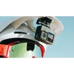 GoPro-style action camera mounted on a white helmet against a bright blue sky backdrop