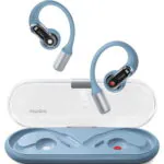 Blue true wireless earbuds with a transparent charging case, earbuds placed nearby as if opened for use.