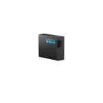 Black GoPro accessory module with a blue GoPro logo and a multi-pin side connector, shown in 3D render on a black background.