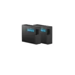 Two black GoPro battery packs standing side by side against a black background, with a blue GoPro logo visible on each unit.