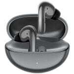 Gray true wireless earbuds resting in an open charging case with a small LED indicator on the front.