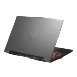 Silver laptop angled with screen closed and red backlit keyboard visible from the bottom-right, set against a black background.