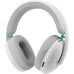 White over-ear headphones with padded gray ear cushions and a teal coiled cable visible at the hinges