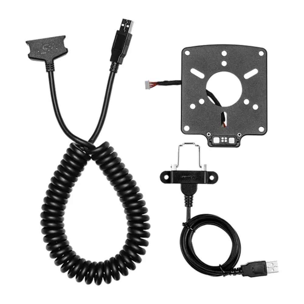 VESA camera/mounting plate with a central circular opening, connected to a coiled cable and a USB power/data lead.