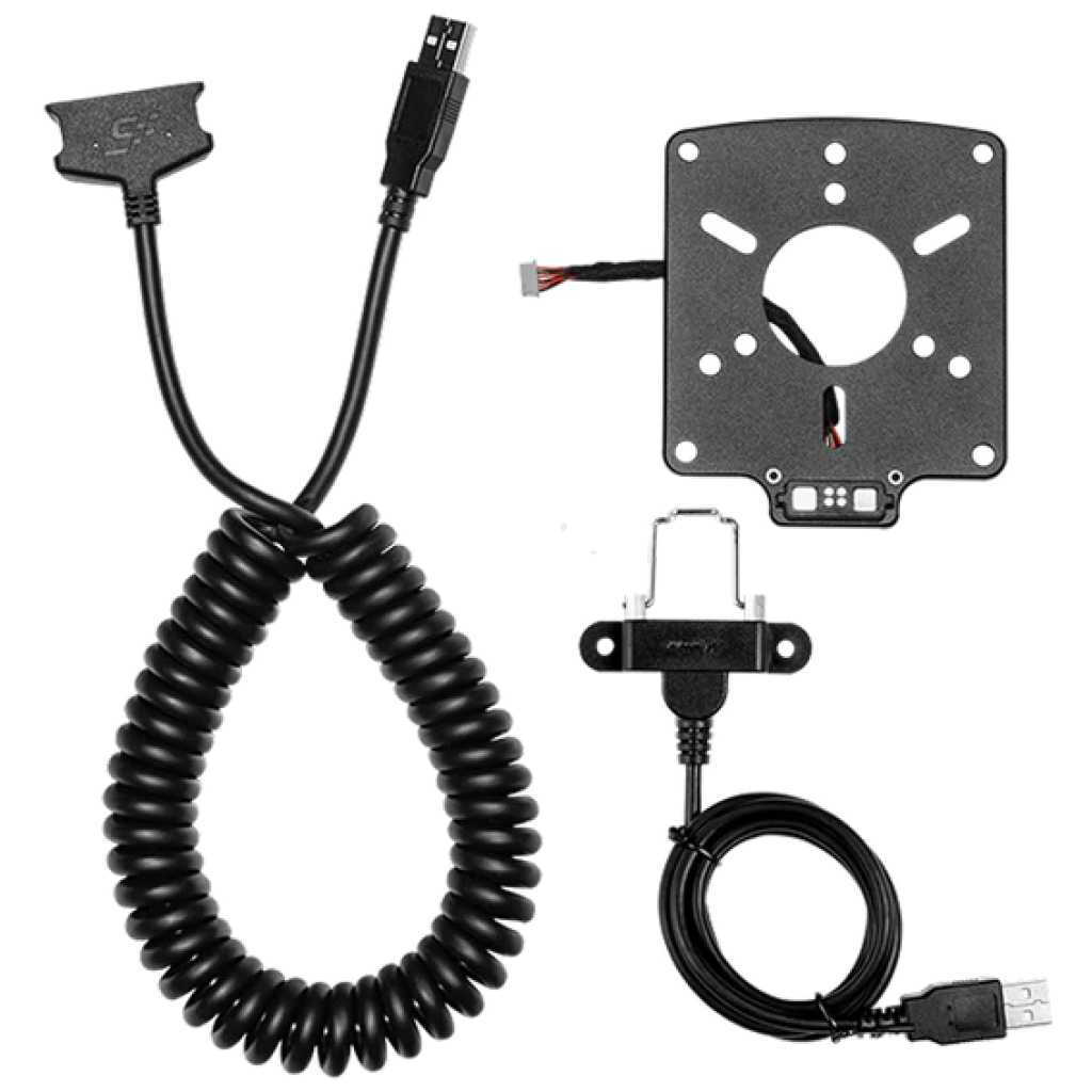 VESA camera/mounting plate with a central circular opening, connected to a coiled cable and a USB power/data lead.