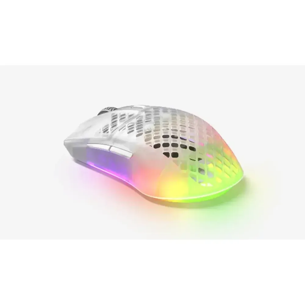 Wireless computer mouse with a translucent lattice shell and rainbow RGB lighting, used for gaming or precision work