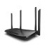 Black wireless router with four external antennas on a white background.