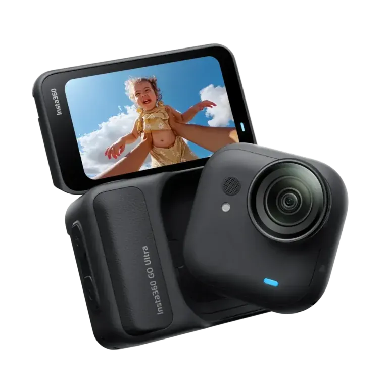 Insta360 Go Lite compact action camera with a built-in screen showing a joyful child being lifted outdoors against a blue sky.