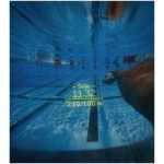 Underwater view of a swimmer in a lane with a digital scoreboard reading Swim 11:32 and 2:10/100m.