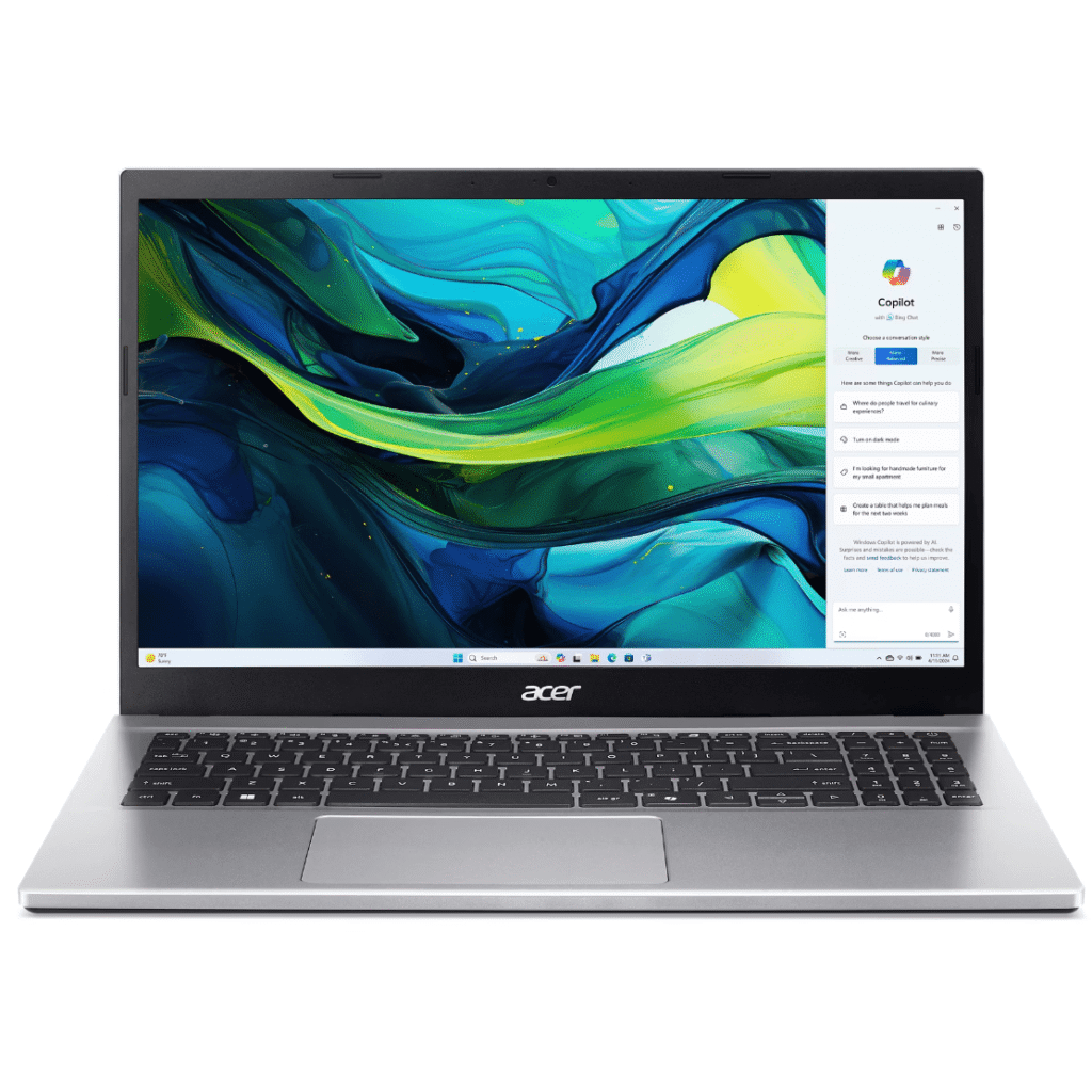 Acer laptop open, colorful abstract wallpaper on screen with Windows Copilot panel on the right side.