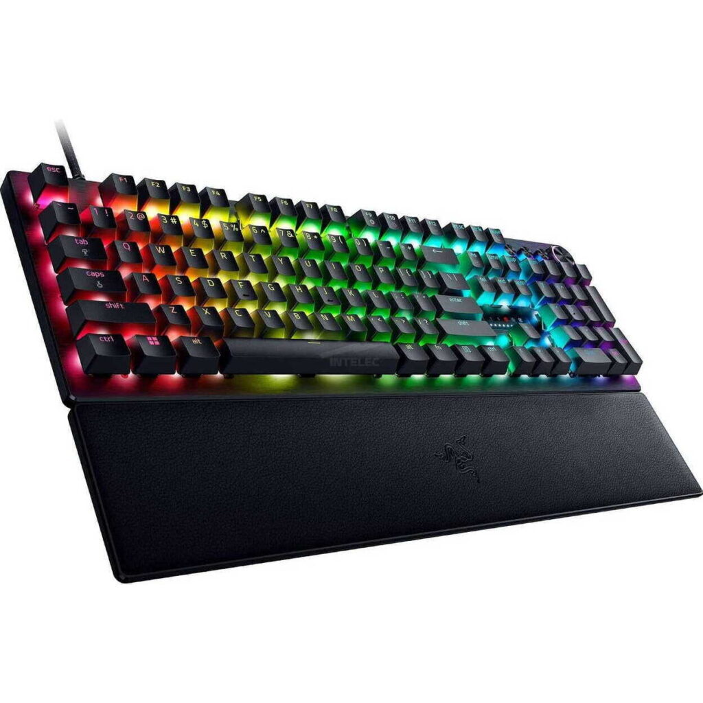 RGB backlit gaming keyboard with a long cushioned wrist rest on a white background