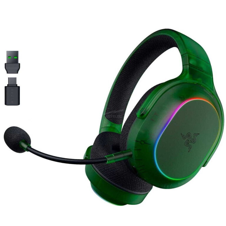 Green wireless gaming headset with mic and USB dongle, shown close-up on ear cup with RGB ring