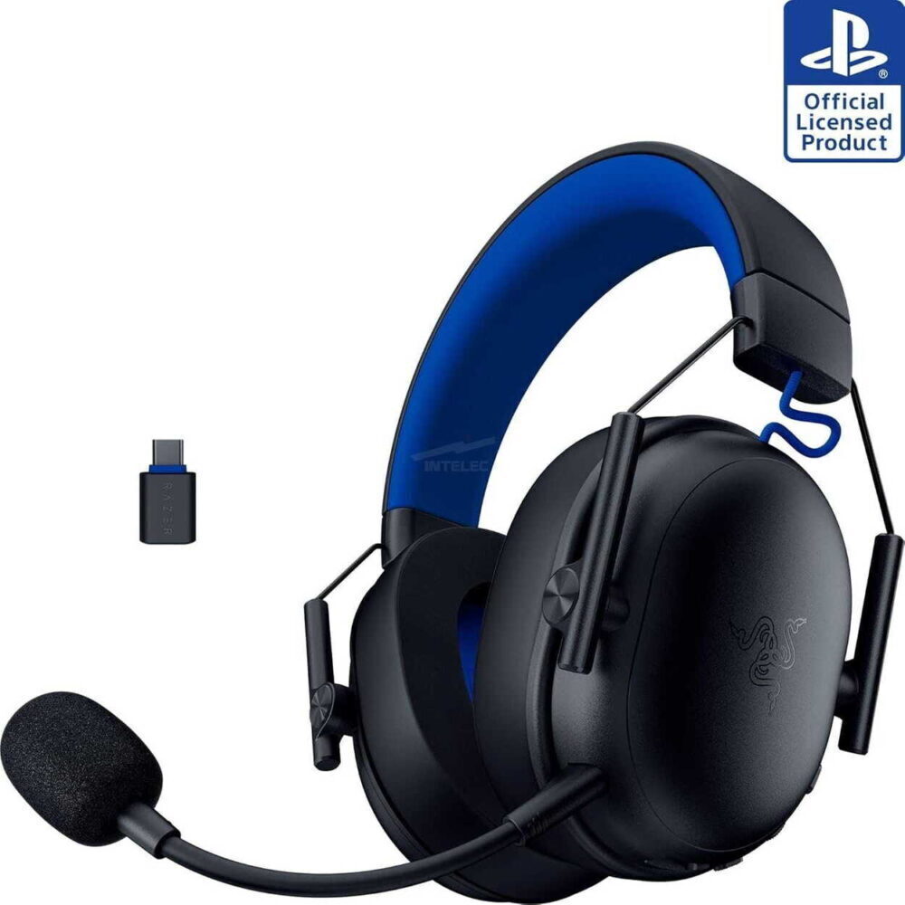 Over-ear gaming headset with blue inner band and detachable boom mic, plus USB dongle nearby; wired to PC.