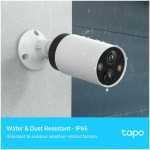 Outdoor surveillance camera mounted on a wall with water droplets, advertising IP65 water/dust resistance and weather protection.