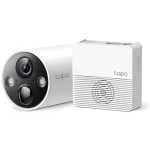 White Tapo security camera with circular front panel and lens, paired with a white base station.