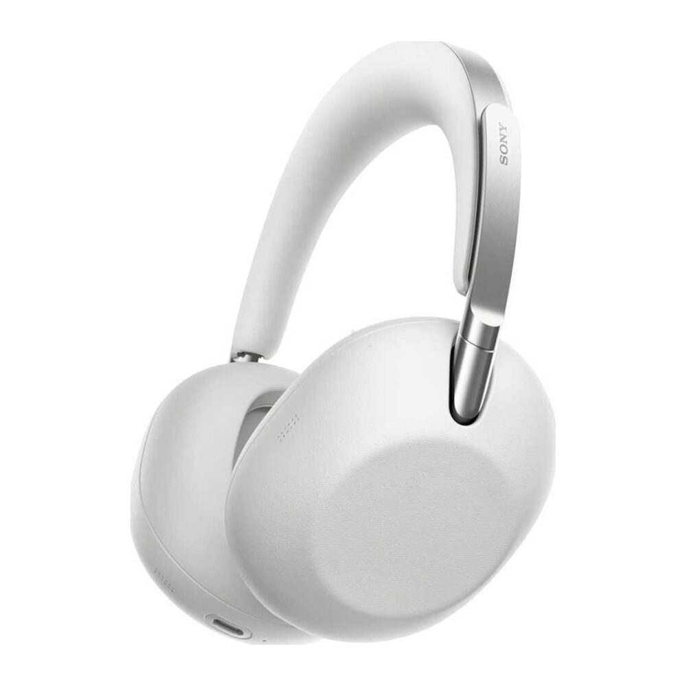 White over-ear Sony headphones with cushioned ear cups and metal headband, angled to show ear cushions and logo.