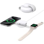White multi-device wireless charging dock charging iPhone, AirPods, and Apple Watch.