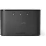 Black Mercusys wireless router with a textured front, four green LED indicators on top front edge, and a subtle logo in the center-right.