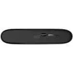Close-up of a black oval portable modem with a Nano SIM slot and multiple side ports viewed from the bottom edge edge-to-edge.