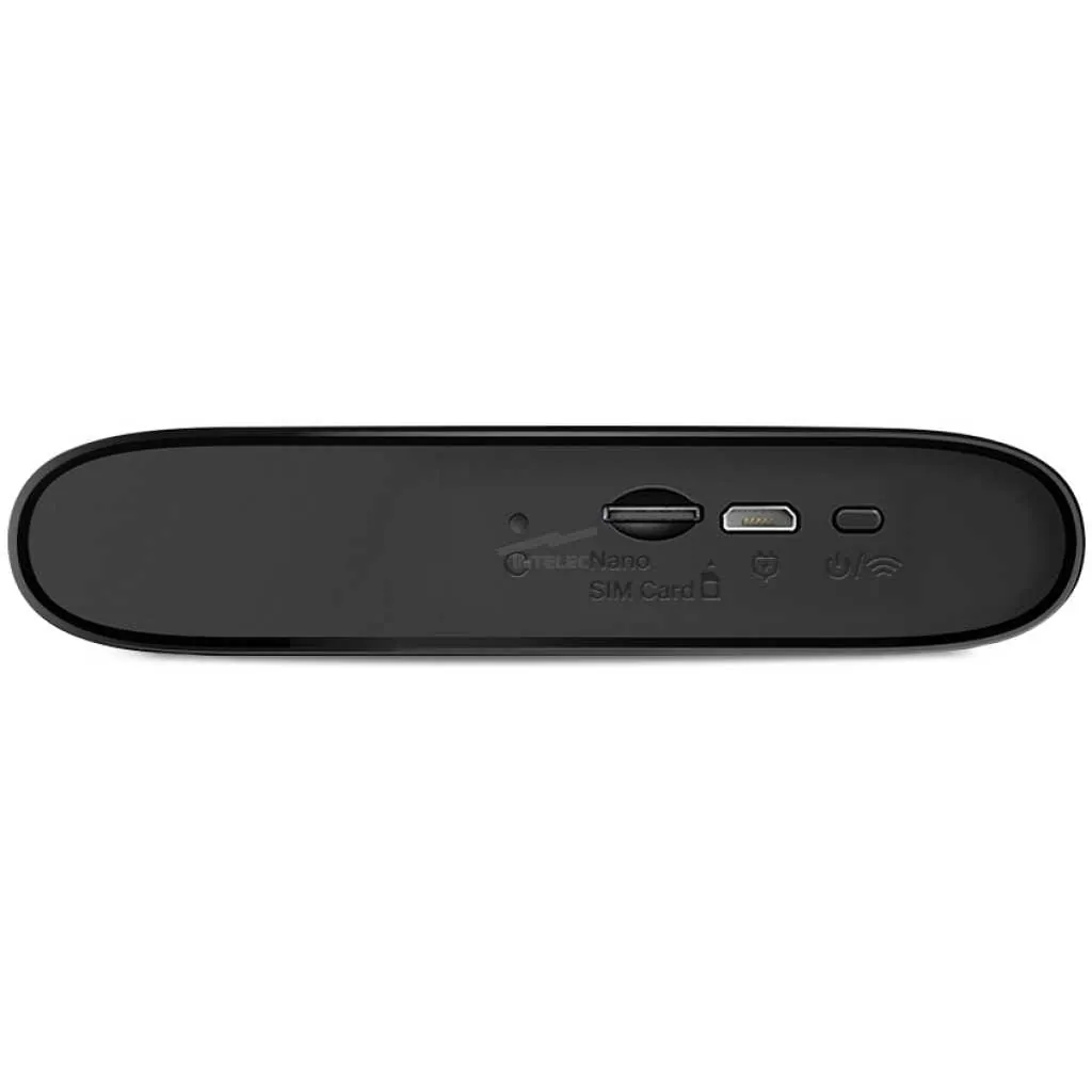 Close-up of a black oval portable modem with a Nano SIM slot and multiple side ports viewed from the bottom edge edge-to-edge.
