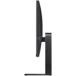 Side view of a dark widescreen computer monitor mounted on a slim rectangular stand against a black background