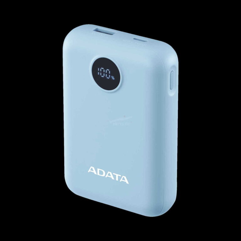 Light blue portable power bank with a round LED battery display showing 100%, viewed from above-left angle.