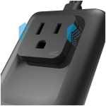 Close-up of a black power outlet integrated into a charging dock, showing two vertical slots and a bottom ground opening, with blue geometric accents.