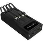 Black multi-slot battery charger with four charging cradles and an LCD display showing charge level/s percentage.