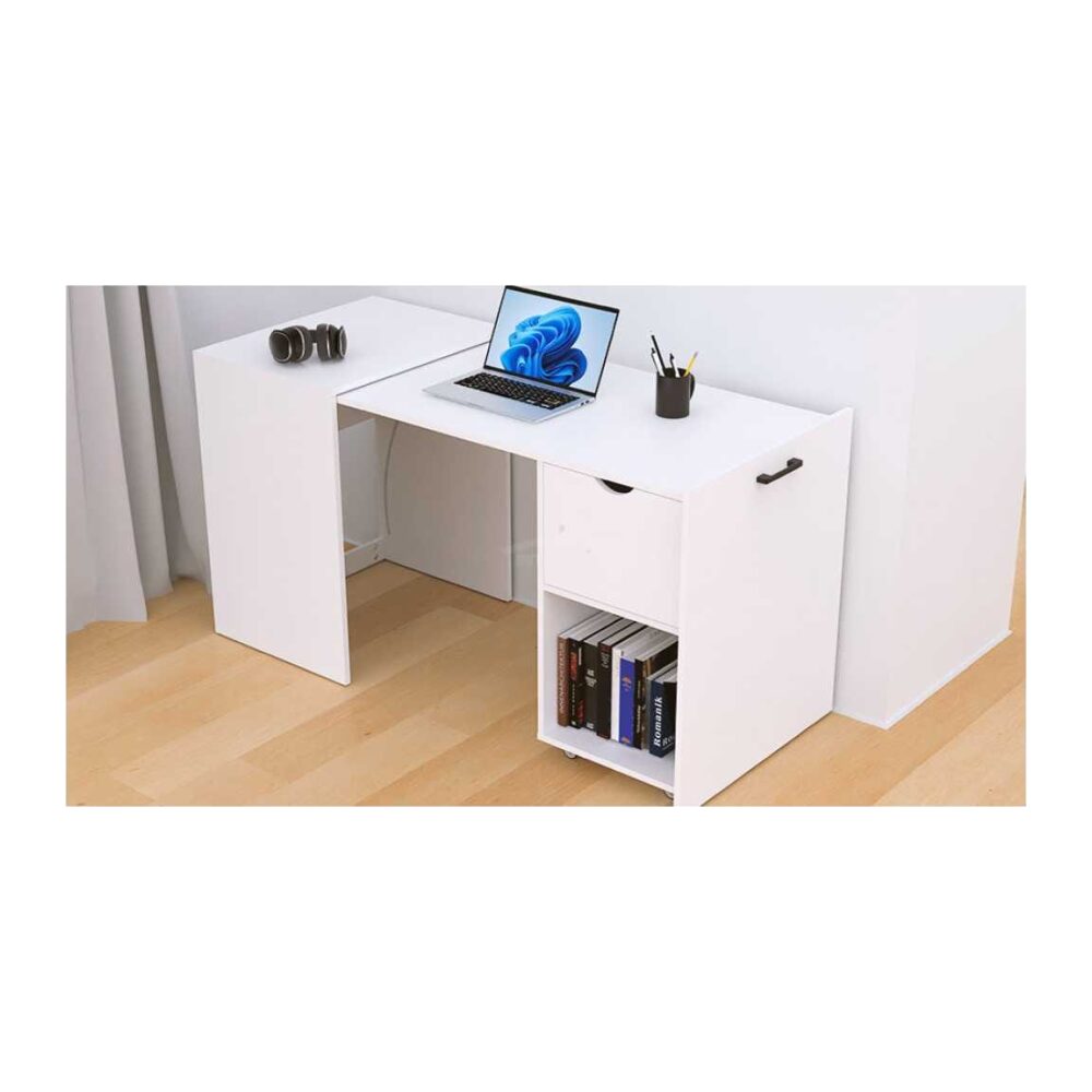 White desk with built-in storage: laptop on top, headphones on the side, and a lower cubby with books.