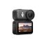 Compact action camera with a top-mounted lens and a rear touchscreen showing a desert landscape video.