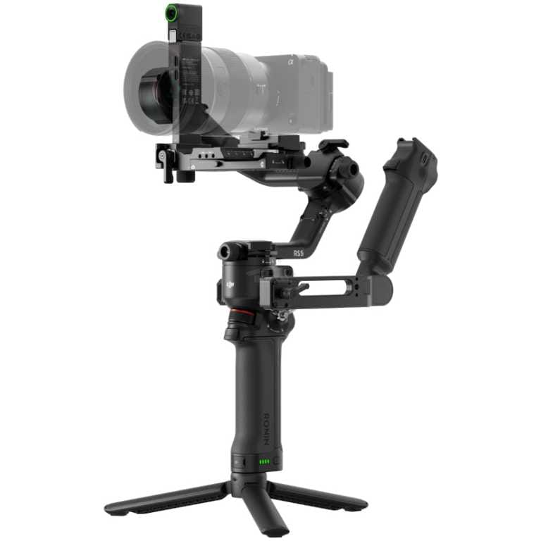 Camera mounted on a three-axis handheld gimbal with a small tripod base for stabilized shooting.