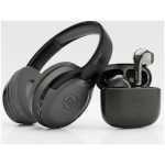 Maxell wireless over-ear headphones with a matching black charging case and earbuds nearby