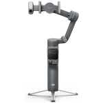 DJI OM smartphone gimbal with adjustable arm and tripod stand for stable video capture.